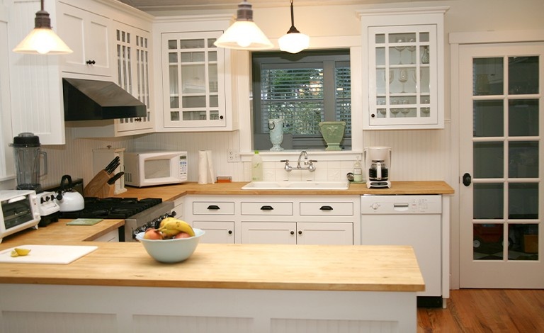 White Cabinets with Butcher-Block Countertops